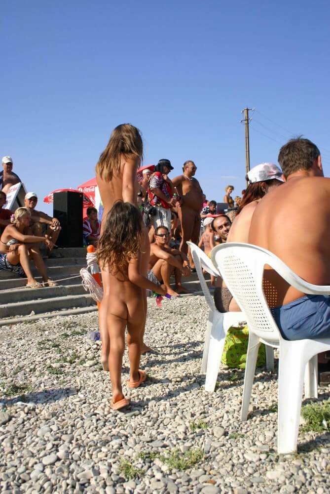 Naturist Standing Sideline - Types of recreation in nudist and naturist resorts and parks