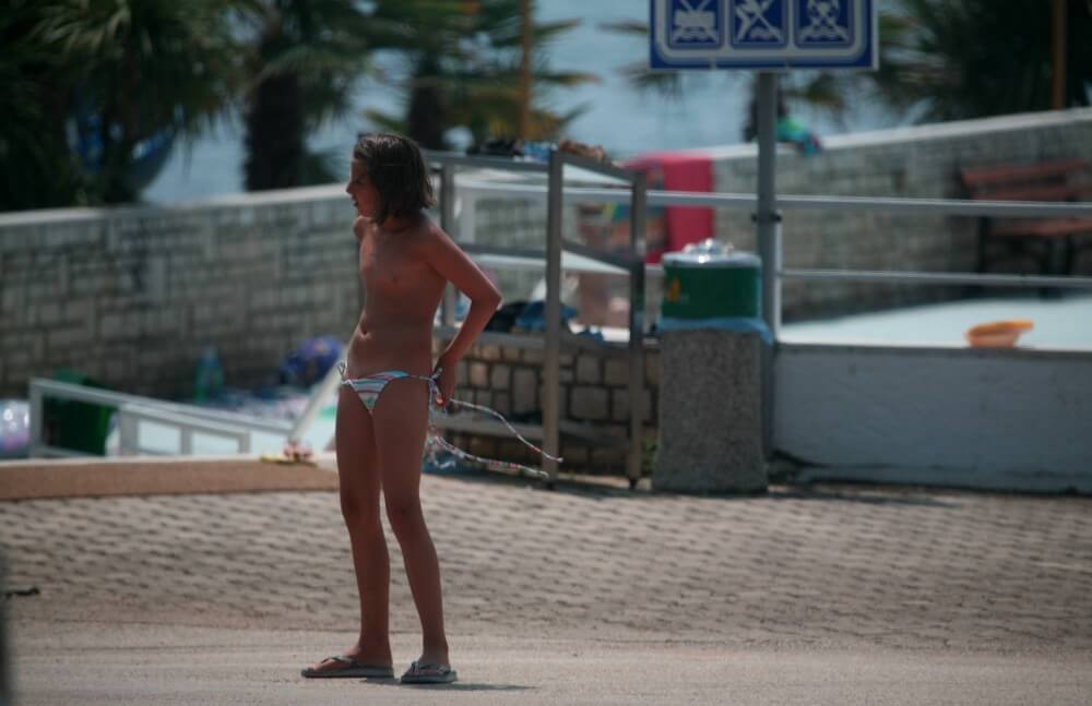 Naturist Pool Walkaround pics - A naked persons soul is visible through their body