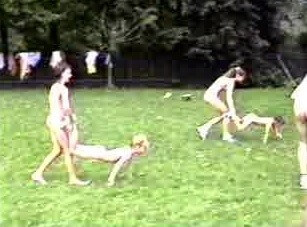 A nudist gathering at the stadium and sports - The True Golden Age of Naturism