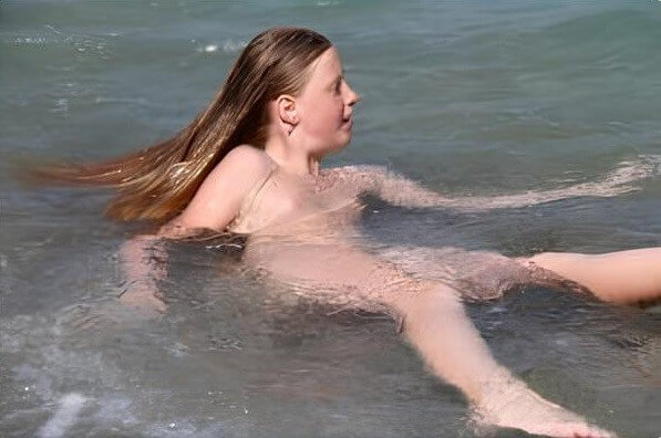 Turqoise Water Splash pics - Only a nudist truly values the connection with nature and the human body