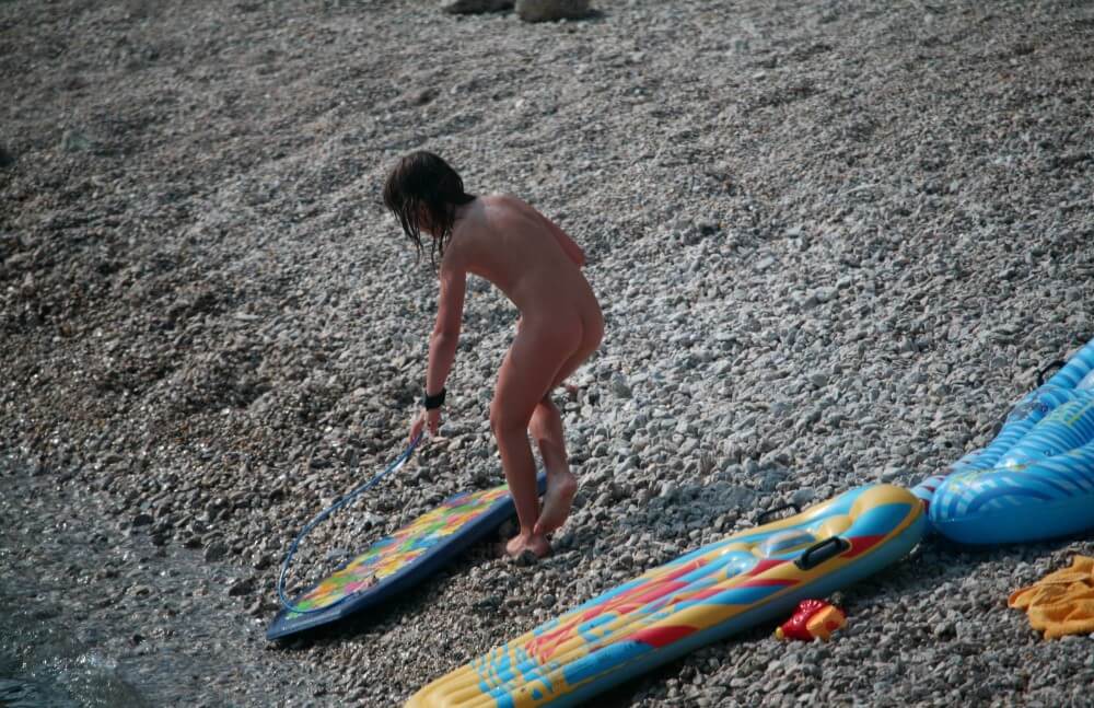 Naturist Surf Board Glides pics - Nudity is seen as a natural and beautiful aspect of life
