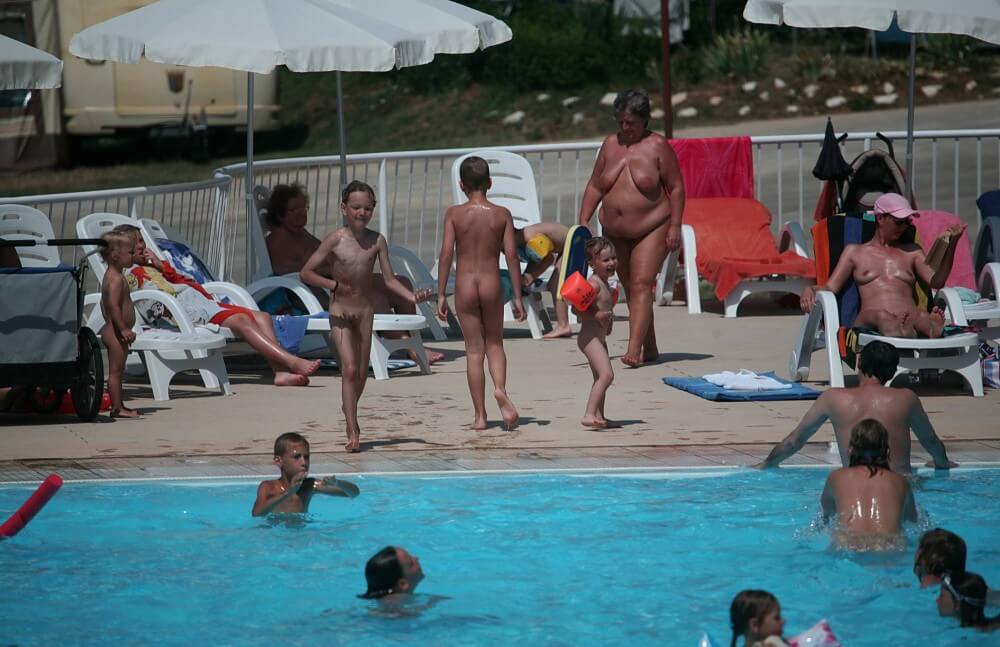 Naturist Afternoon Pool Games pics - People seek in nudism a way to overcome their insecurities