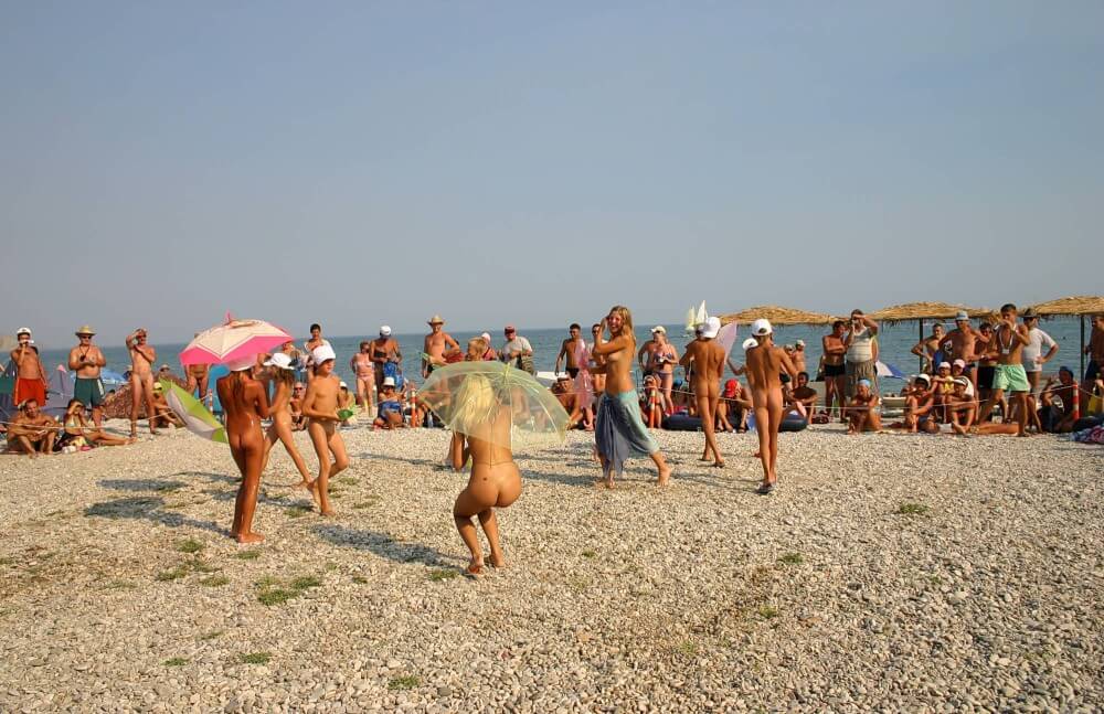 Ribbon and Umbrella Dance pics - Many consider a free body and nudism to be central to their lives