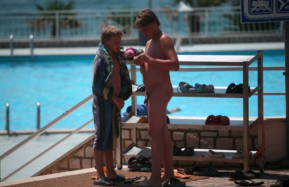Scooter Travel Mid Day pics - A defining feature of naturism is the absence of clothing
