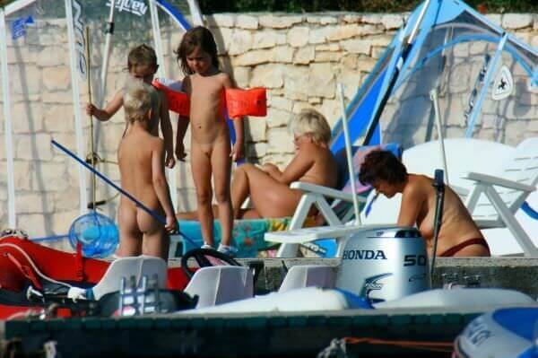 By the boat photos - Naturists live freely and naturally